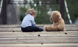 baby with teddy bear