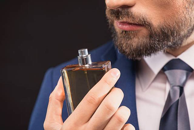 successful-businessman-likes-perfume-scent