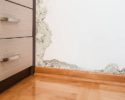 mold-damage-caused-by-damp-on-a-wall-in-modern-house