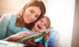 mother-and-little-daughter-reading-book