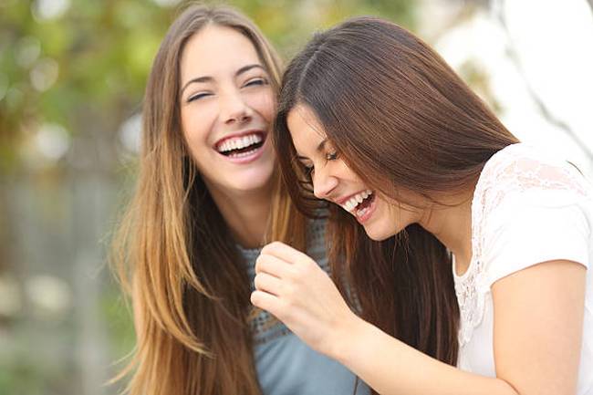 women-friends-laughing