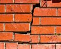 close-up-broken-brick-wall